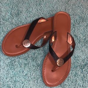 Selling these black and Gold Sandals